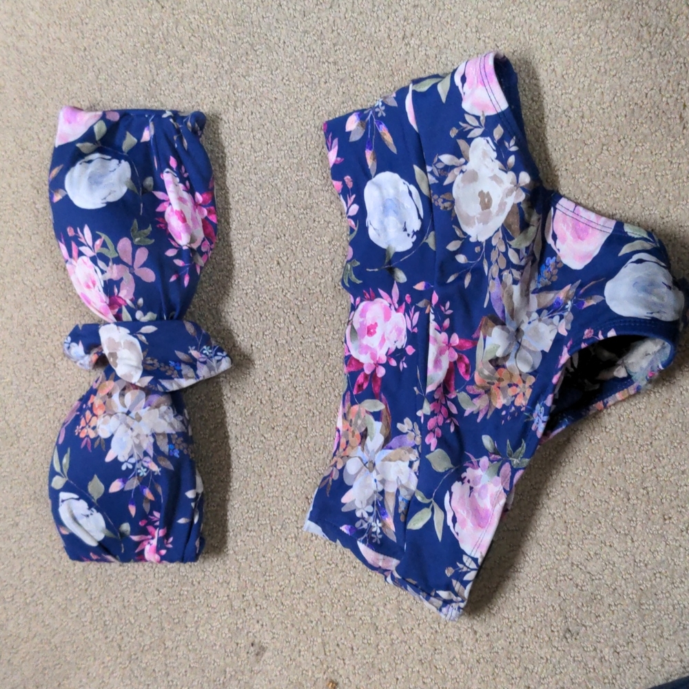 Kittenish two-piece swimsuit.